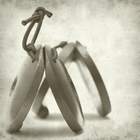 textured old paper background with castanetsの写真素材