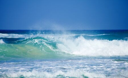 breaking waves horizontal natural backgroundの写真素材