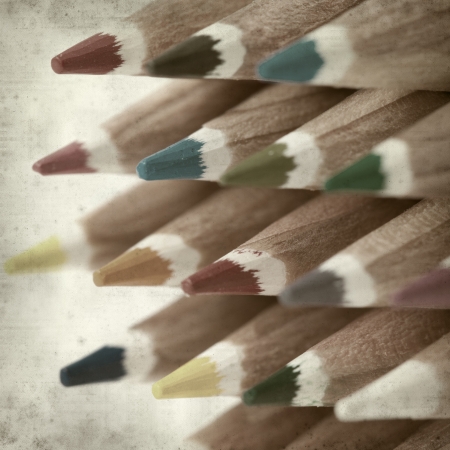 textured old paper background with color pencilsの写真素材