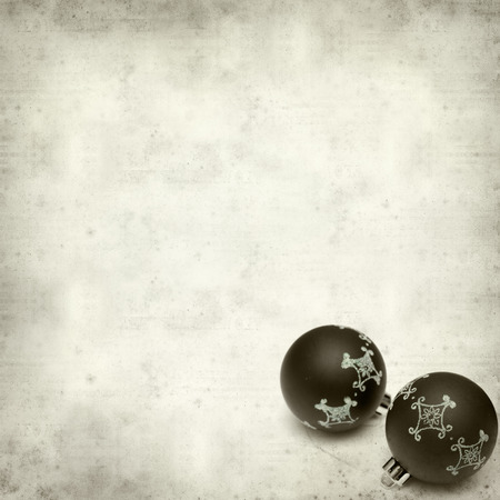 textured old paper with Christmas decorationsの写真素材