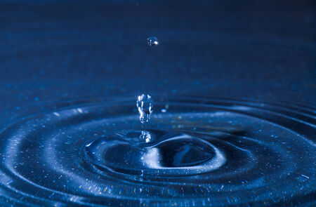 water drops splashing, natural backgroundの写真素材
