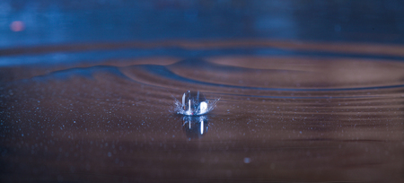 water drops splashing, natural backgroundの写真素材