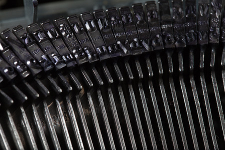 old typewriter type bars, mechnical backgroundの写真素材