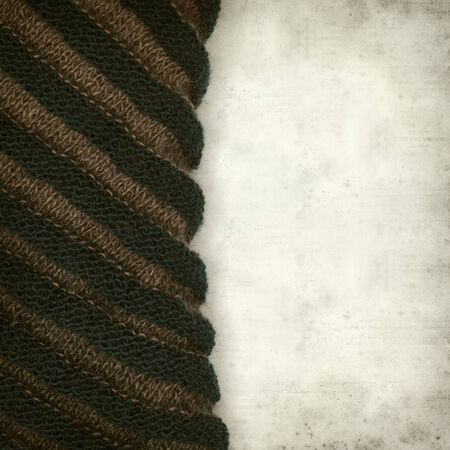 textured old paper background with double sided knittingの写真素材