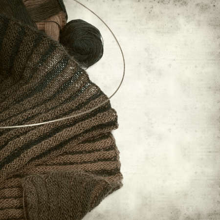 textured old paper background with double sided knitting