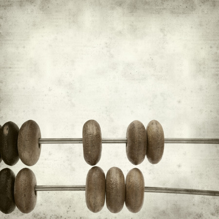 textured old paper background  with wooded abacusの写真素材