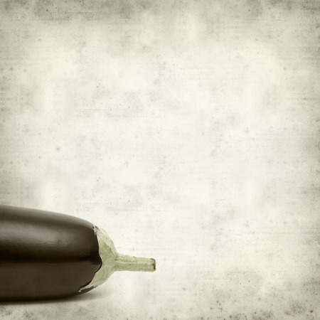 textured old paper background with eggplantの写真素材