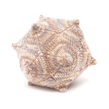 unusual knitted object - dodecahedron isolated on white