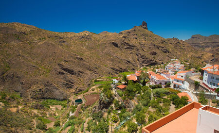 Volcanic plug Roque Bentayga seen over Tejeda village, Gran Canariaの写真素材
