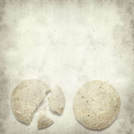 textured old paper background with almond biscuitの写真素材