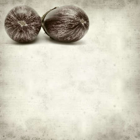 textured old paper background with eggplantの写真素材