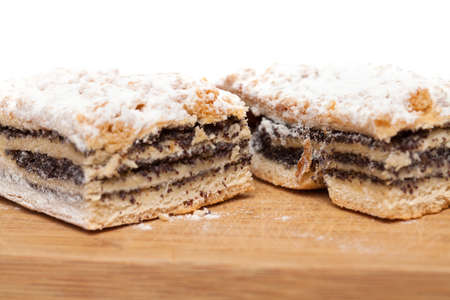 poppyseed cake isolated on whiteの写真素材