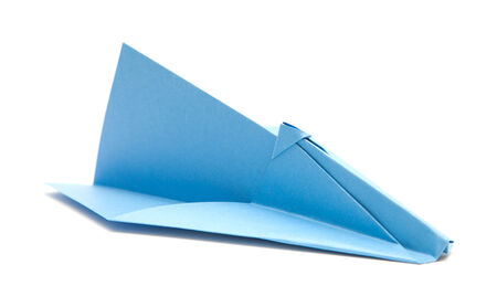 blue paper plane isolated on whiteの写真素材