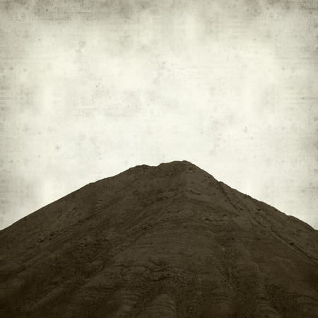 textured old paper background with Tindaya, sacred mountain of Fuerteventuraの写真素材