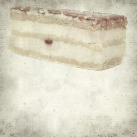 textured old paper background with strawberry cakeの写真素材