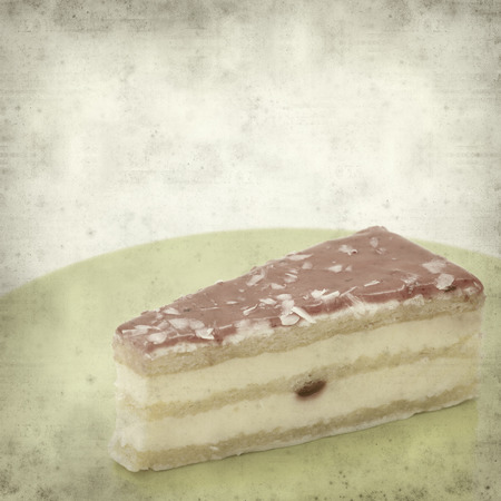 textured old paper background with strawberry cake