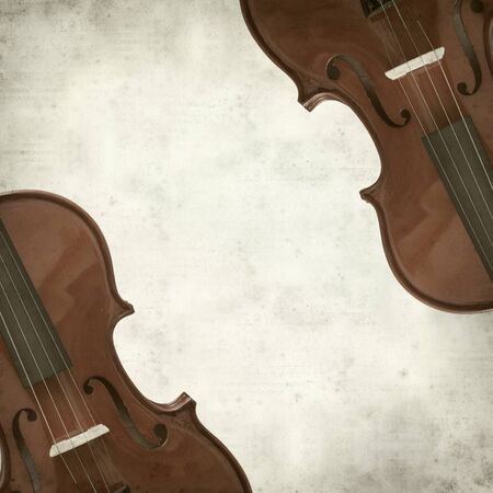 textured old paper background with violinの写真素材
