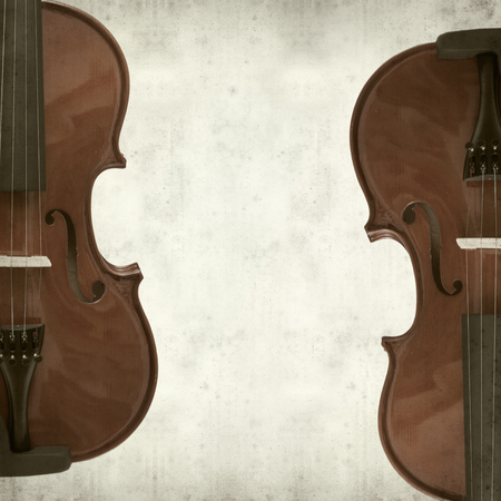textured old paper background with violinの写真素材