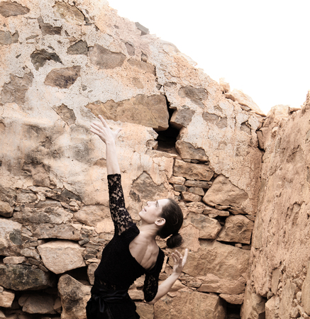 flamenco dancer in a black dress in a ruined houseの写真素材