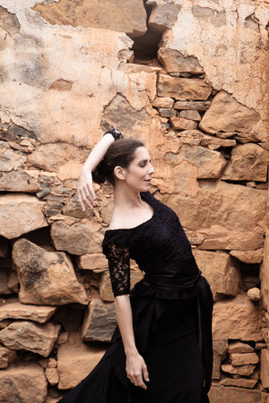 flamenco dancer in a black dress in a ruined houseの写真素材