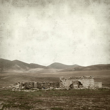textured old paper background with landscape of Fuerteventuraの写真素材