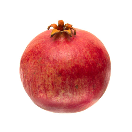 whole pomegranate isolated on white backgroundの写真素材