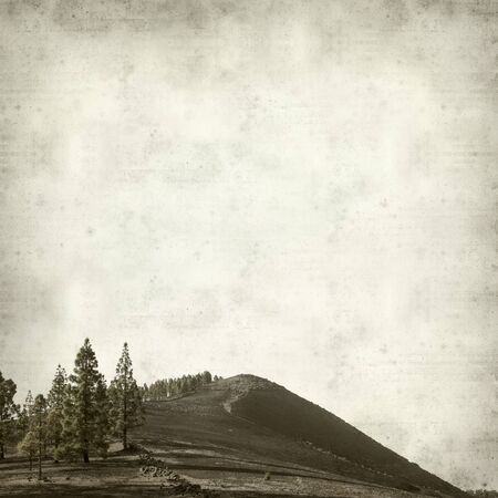 textured old paper background with landscape of Gran Canariaの写真素材