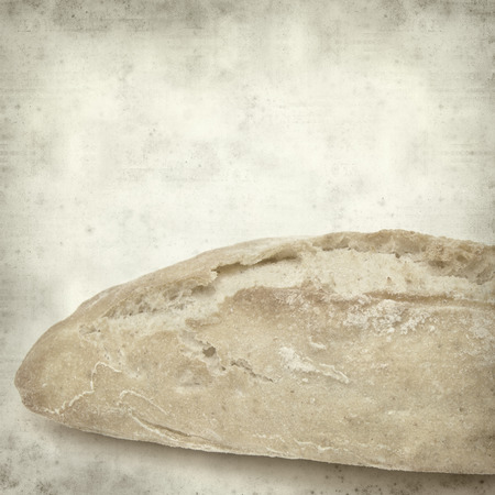 textured old paper background with gralitian mini bread