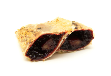 Canary islands sweets - truchas de fruta. Trucha is literally a trout, which refers to fish-like shape of the pastry, traditionally filled with sweet potato, but with possible variations, here filled with summer fruitの写真素材