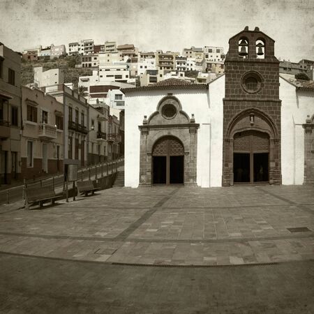 textured old paper background with historic part of San Sebastian de La Gomeraのeditorial素材