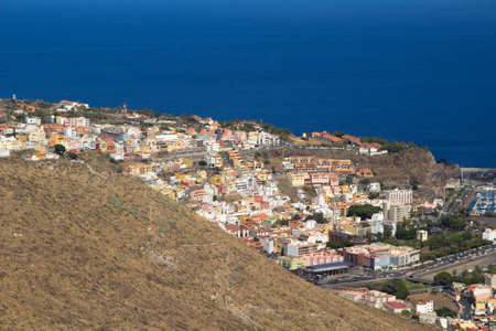 La Gomera, Canary islands, main town San Sebastian de La Gomera, as seen from low mountains to its westの写真素材