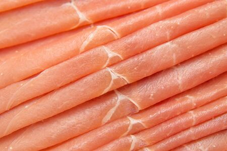 thin slices of dry cured ham food backgroundの写真素材