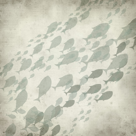 textured old paper background with many swimming fishの写真素材