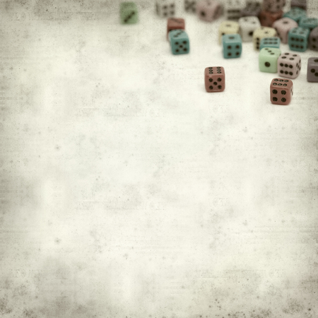textured old paper background with many small dice