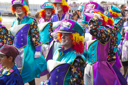 LAS PALMAS - February 13: Music and dancer groups in colorful costumes take part in the Las Canteras beach carnival parade "Carnaval al Sol", February 13, 2016 in Las Palmas, Gran Canaria, Spainのeditorial素材