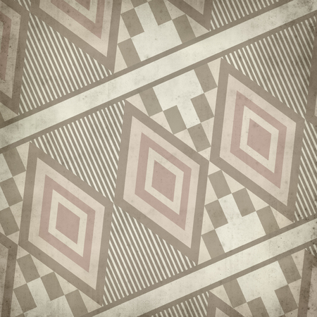 textured old paper background with ethnic geometrical patternの写真素材