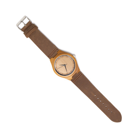 wristwatch with wooden corpus and face isolated on whiteの写真素材