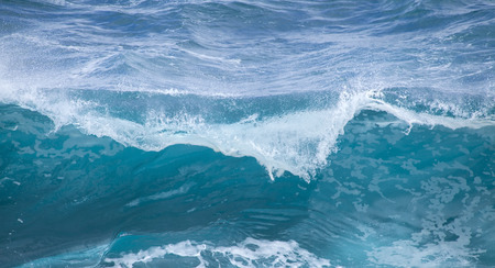 powerful foamy ocean waves breaking by the shores of Gran Canaria