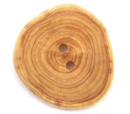 handmade wooden buttons isolated on whiteの写真素材