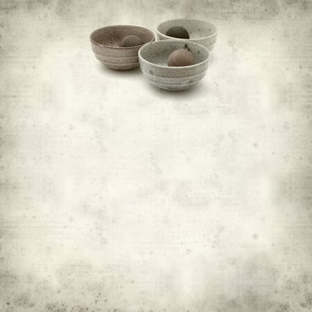 textured old paper background with wooden balls air freshenersの写真素材