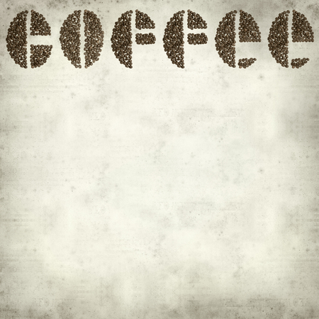 textured old paper background with letters made of coffee grainsの写真素材