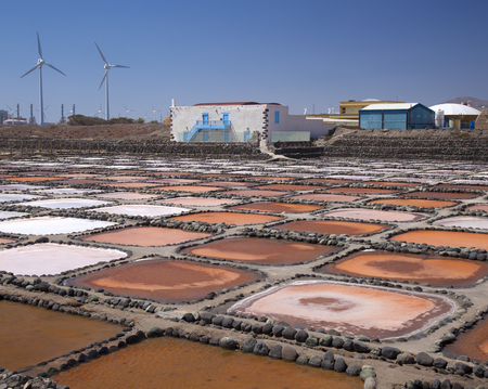 Gran Canaria, Salt evaporation ponds Salinas de Tenefe, south east of the island, pink color created...