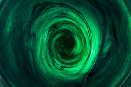 moving ink in water spiral abstractの写真素材