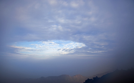 Canary Islands, Tenerife,  ascending Teide, the tallest mountain of Canary Islands and Spain, calima dust layer blanketing the viewの写真素材