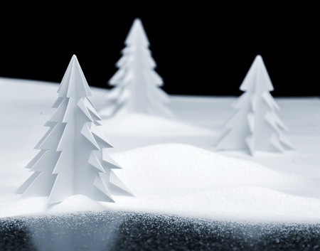 model Christmas landscape with kirigami, fold and cut, trees, snow and iceの写真素材