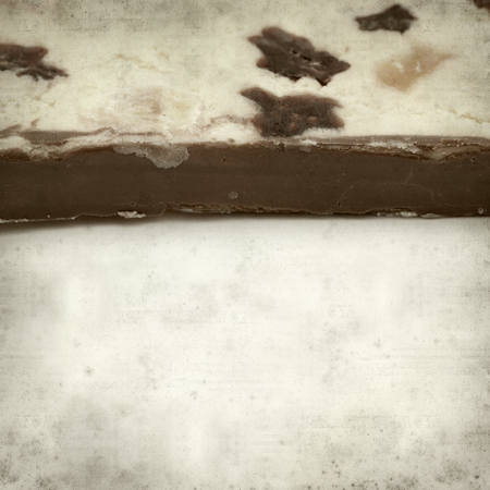 textured old paper background with turron, traditional Spanish sweetの写真素材