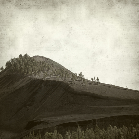 textured old paper background with Gran Canaria landscape, Galdar municipality, black volcanic ash  Montanon Negro, Black Montainの写真素材