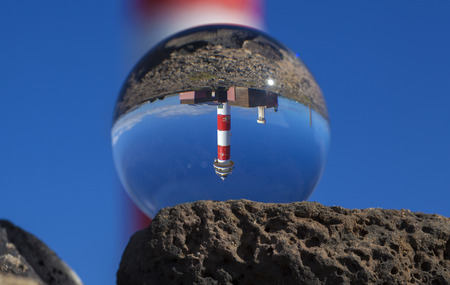 crystal ball photography - Fuerteventura, Canary Islands, lighthouse Faro de Toston close to El Cotillo villageの写真素材
