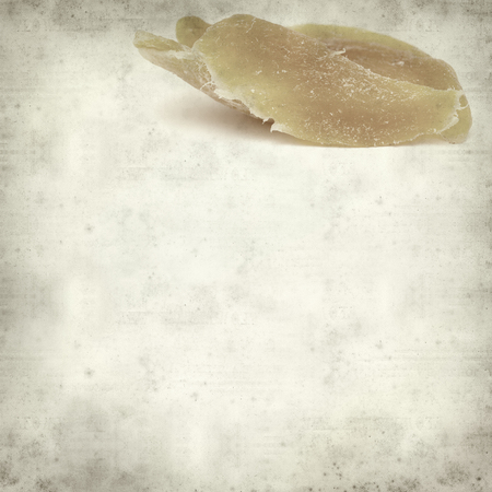 textured old paper background with dried fruitの写真素材