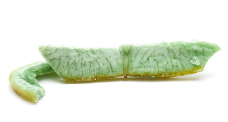 dried fruit isolated on white background - green pomelo skinの写真素材